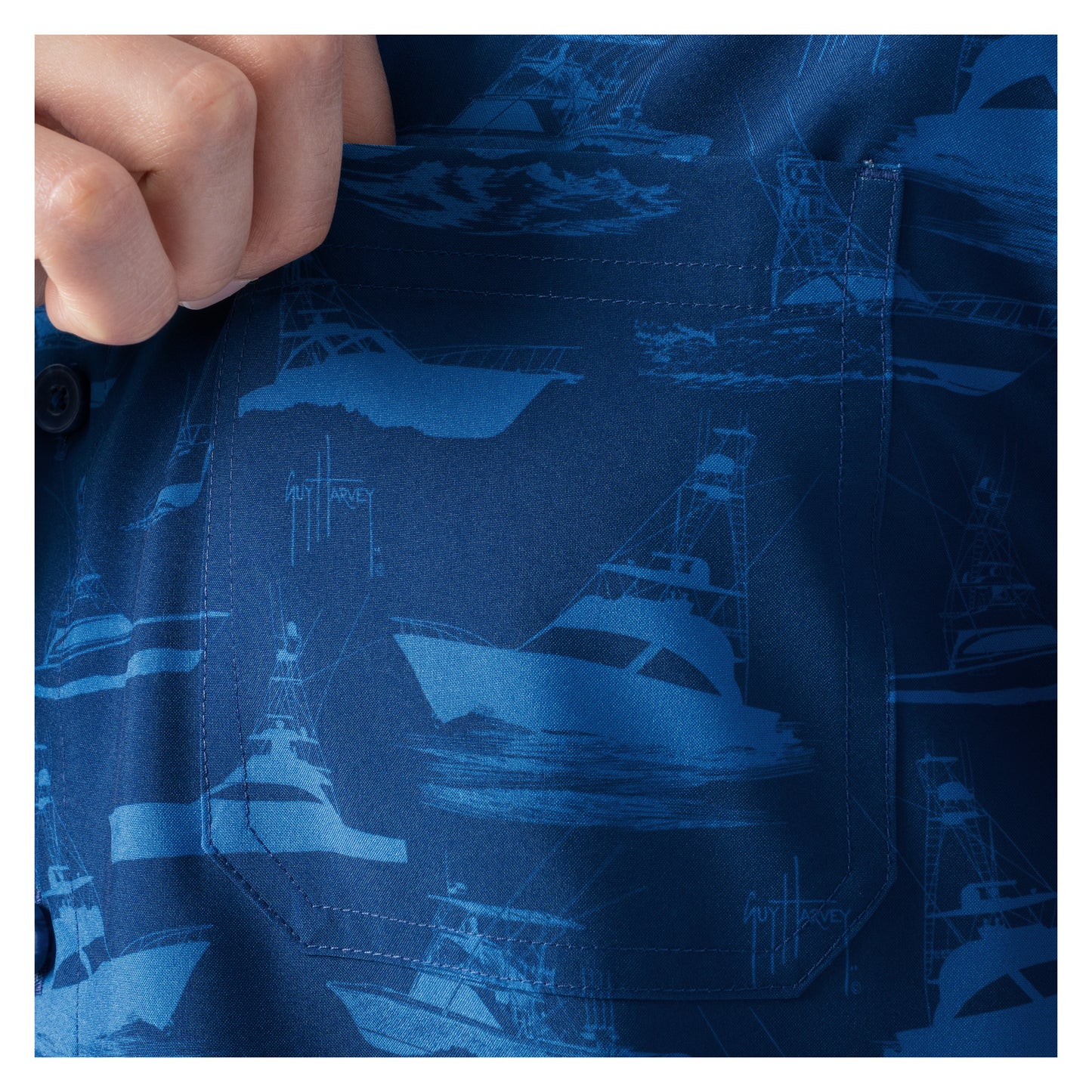 Close-up of a blue shirt with ship pattern
