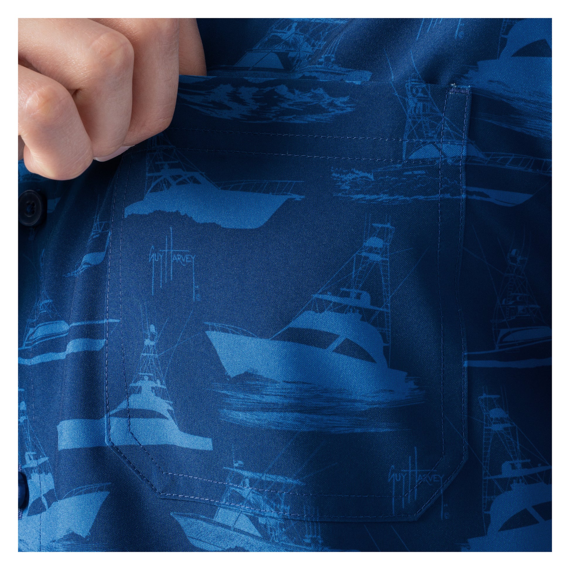 Close-up of a blue shirt with ship pattern