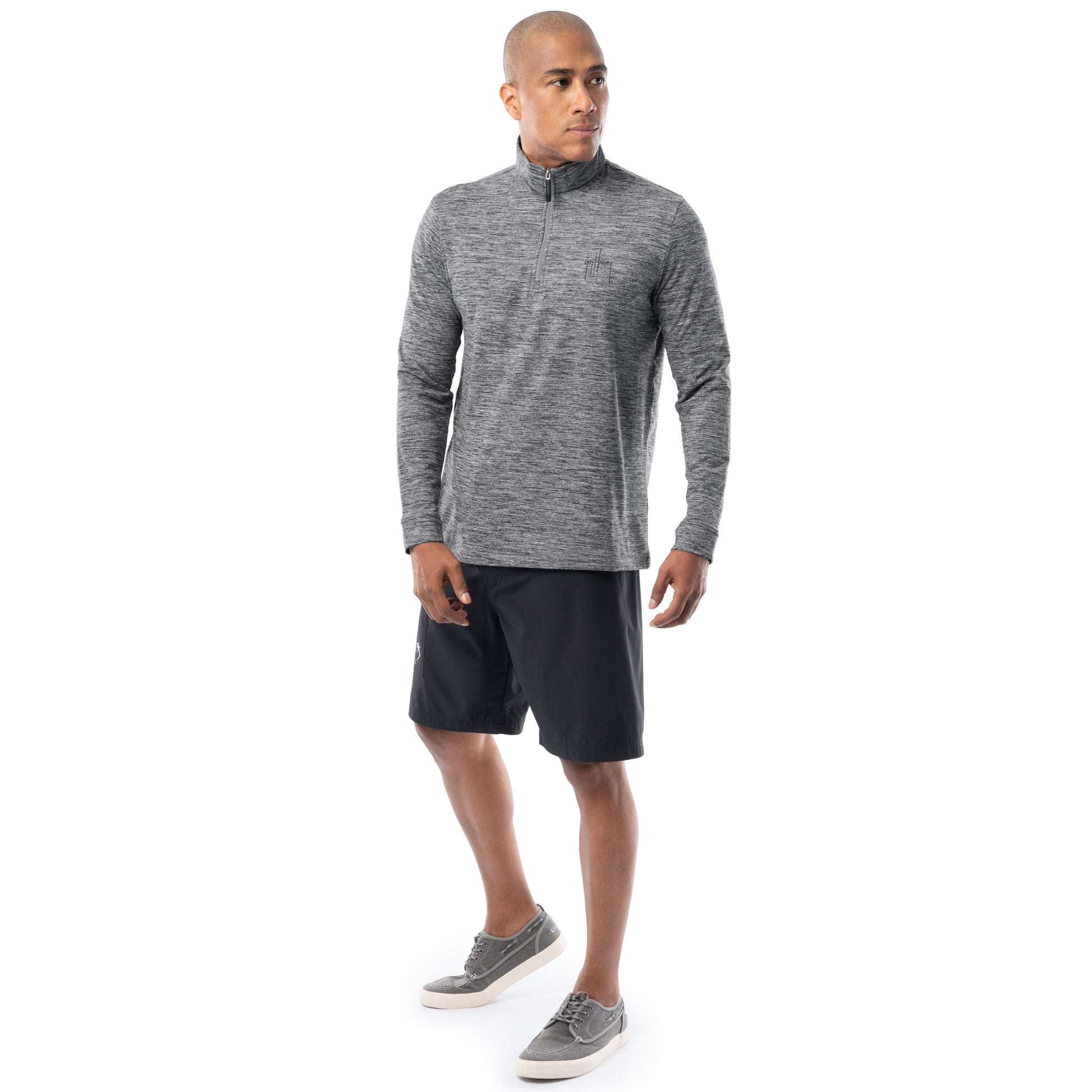Guy Harvey men’s heather gray fleece quarter zip pullover styled with black shorts, full-body view
