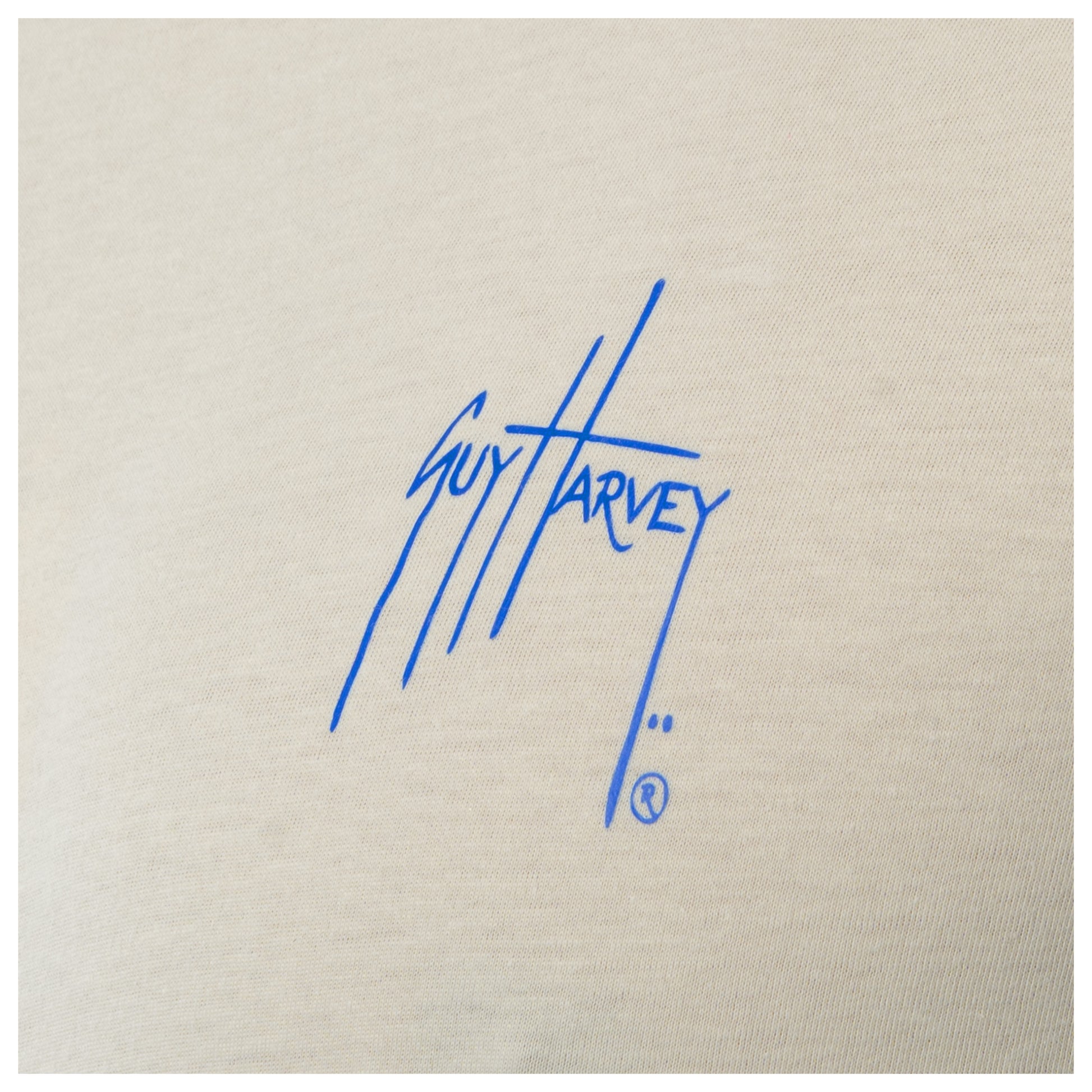 Blue signature on beige fabric background