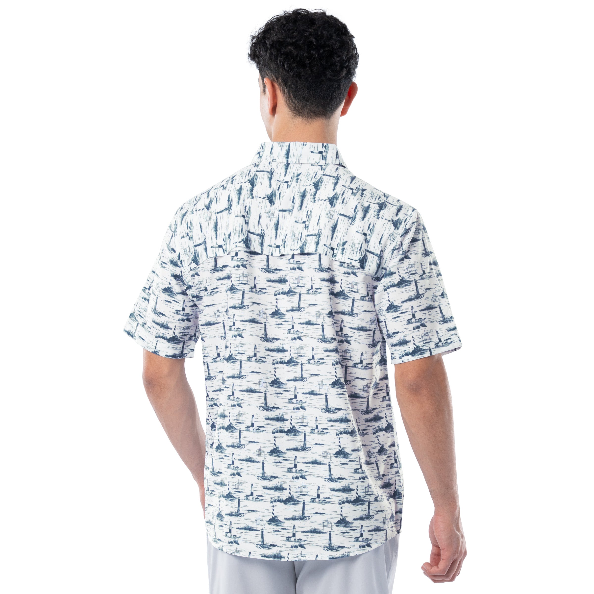 Man wearing a white shirt with blue pattern on a white background