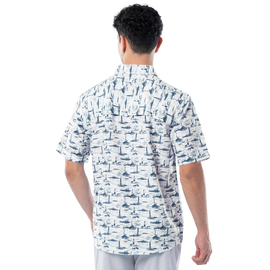 Man wearing a white shirt with blue pattern on a white background
