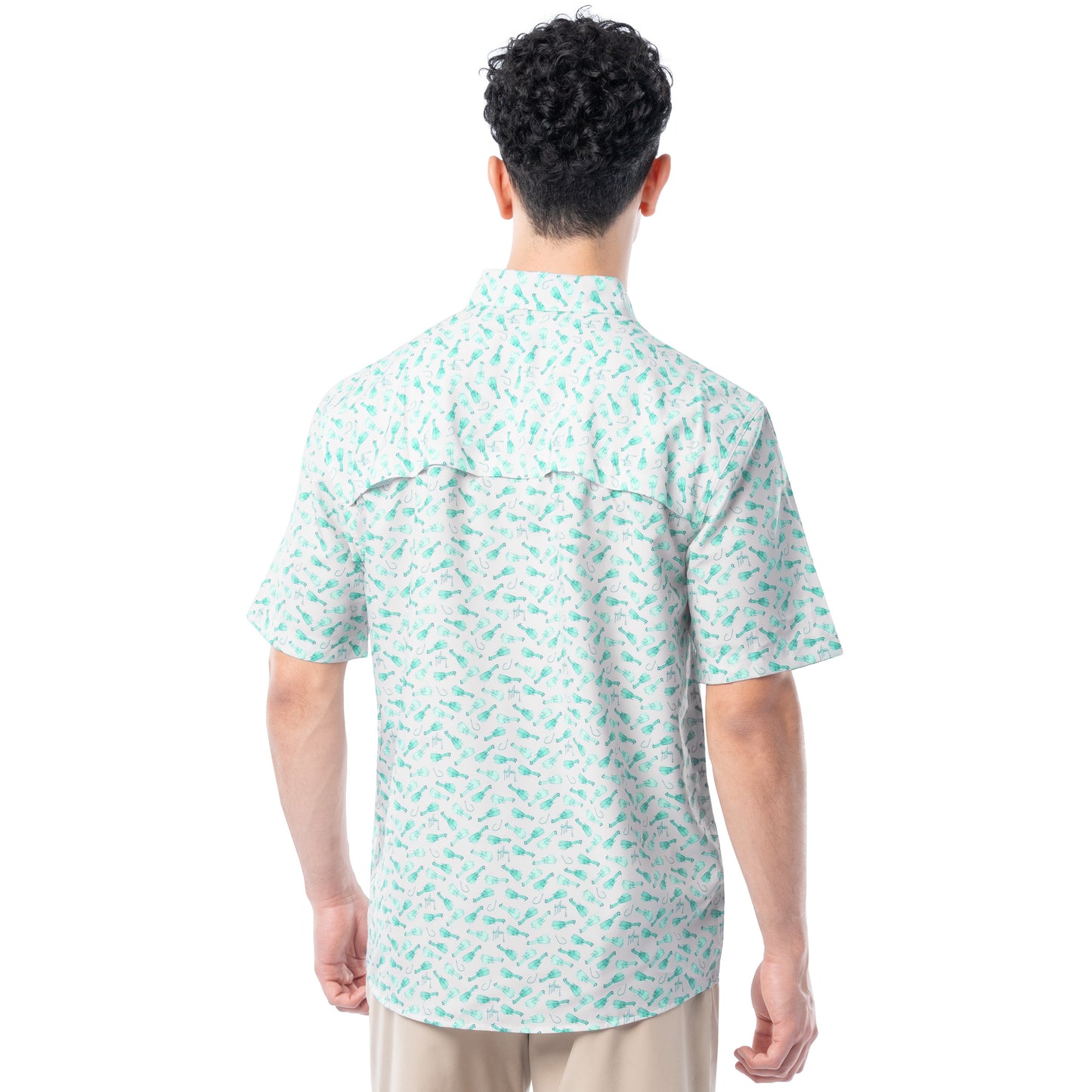 Person wearing a light green patterned shirt on a white background
