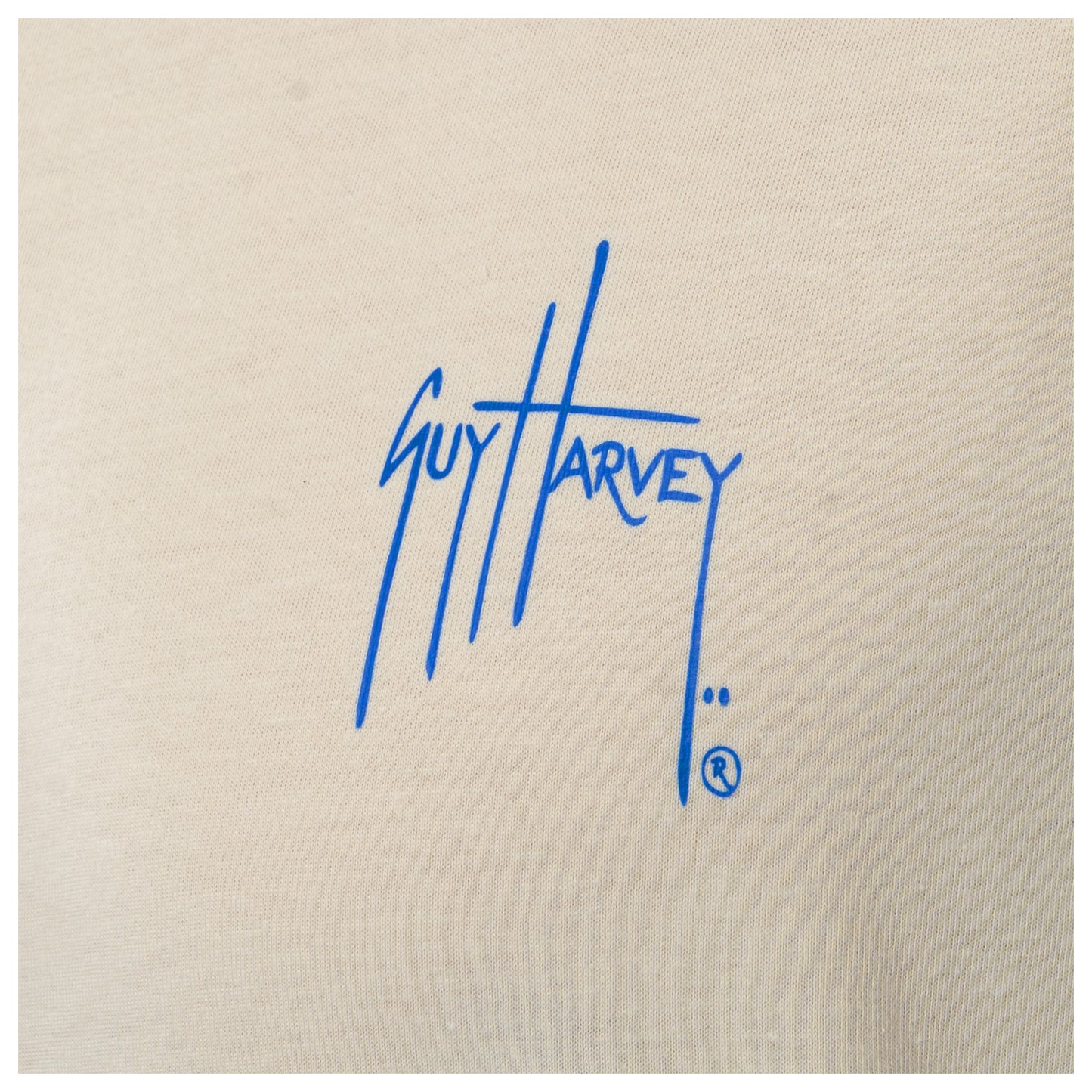 Beige fabric with blue Guy Harvey logo