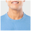 A close-up of the crew neck on the t-shirt