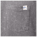 Gray pocket with a brand tag on a washed gray background