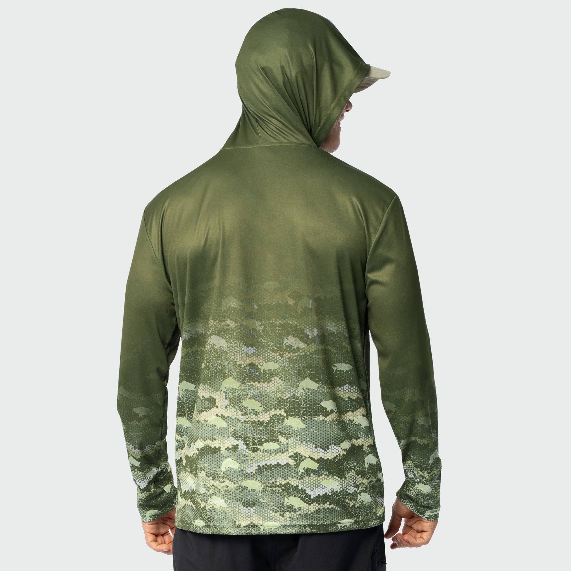 Green camouflage hoodie worn by a person on a light gray background