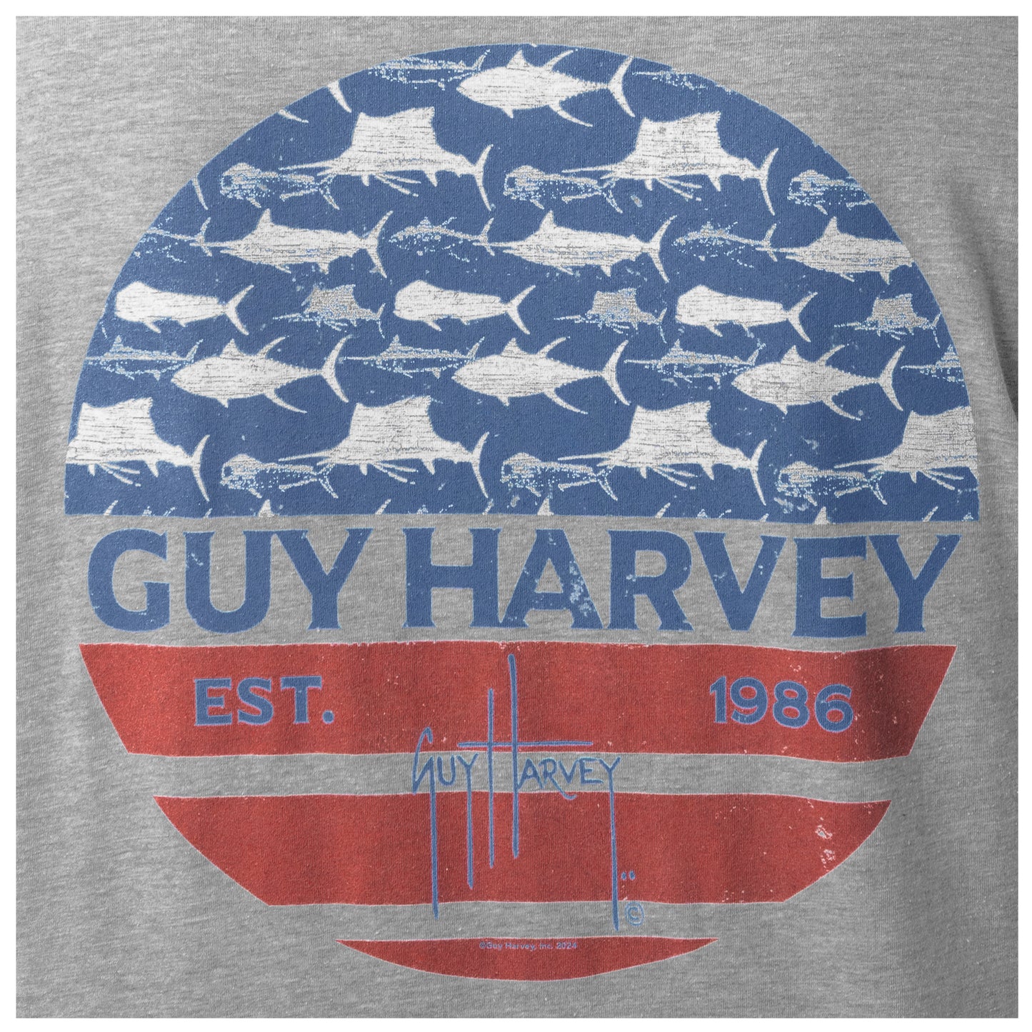 Gray t-shirt with Guy Harvey logo featuring blue and red design on a gray background with billfish and mahi on it.