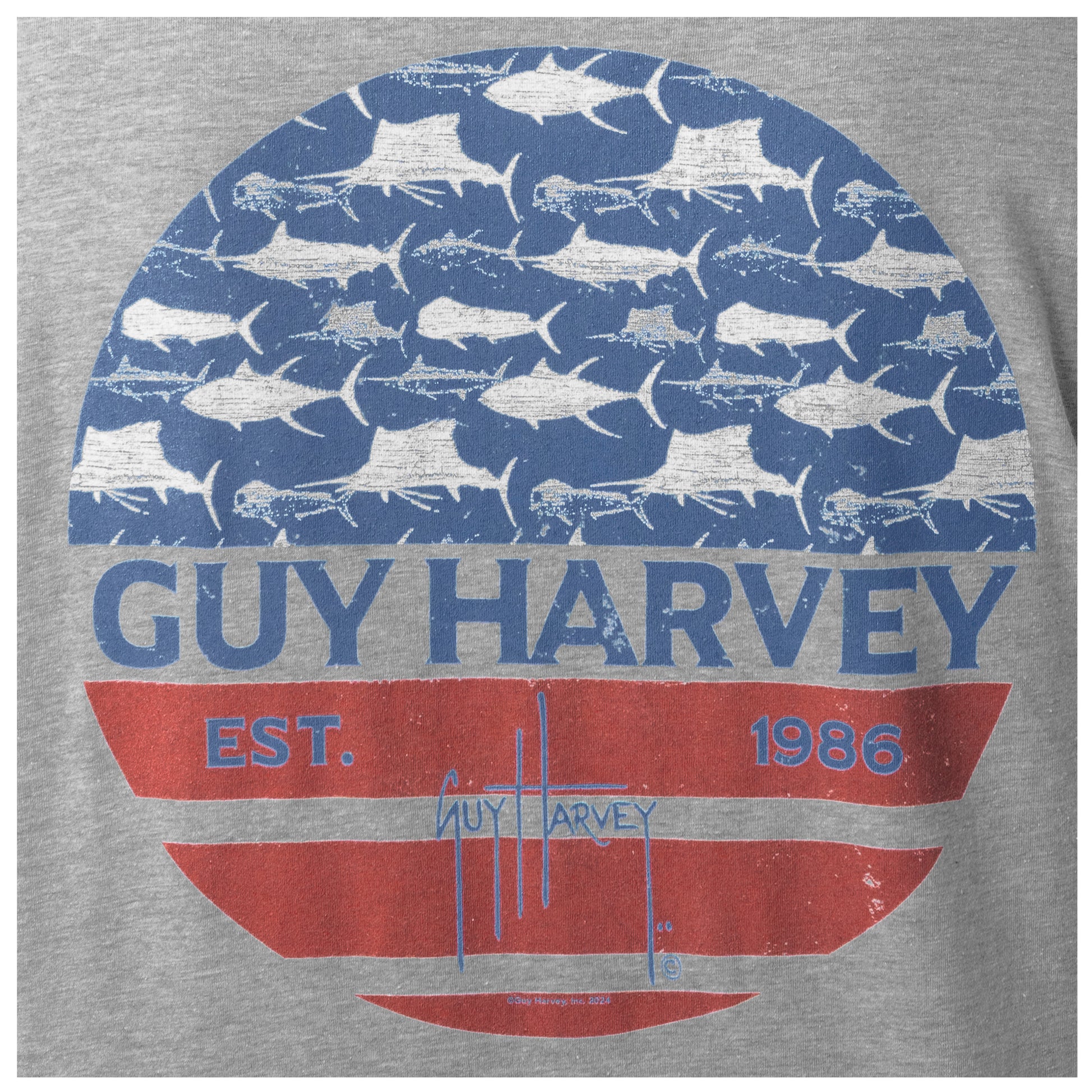 Gray t-shirt with Guy Harvey logo featuring blue and red design on a gray background with billfish and mahi on it.