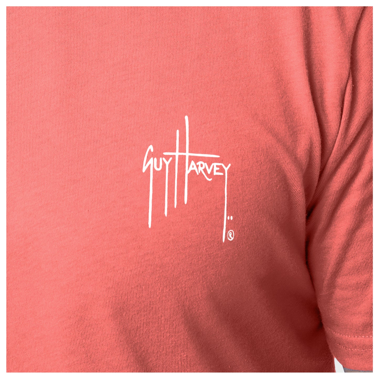 Coral t-shirt with Guy Harvey logo on a white background