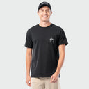 Man wearing a black pocket t-shirt with a Guy Harvey logo on a plain background