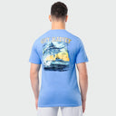 Person wearing a blue Guy Harvey t-shirt with a marlin graphic on the back