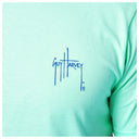 Light green shirt with Guy Harvey logo on a white background