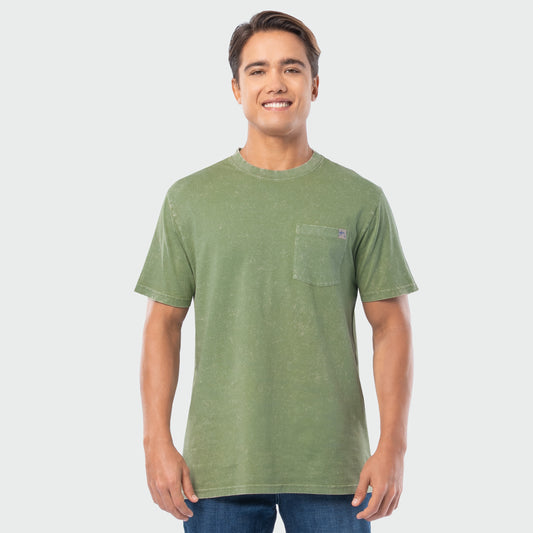 Man wearing a green washed t-shirt with a pocket on a white background