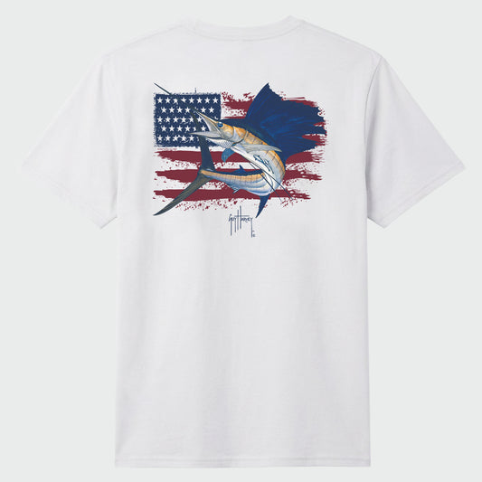 Flat lay image of a white t-shirt with a graphic design on the back, featuring an American flag and a sailfish.