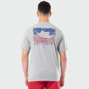 Person wearing a Guy Harvey t-shirt with an American flag and sailfish design on the back.