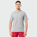 Man wearing a gray t-shirt with a small Guy Harvey logo on a white background