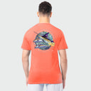 Person wearing a coral t-shirt with a marlin, wahoo, tuna and mahi design on the back against a white background