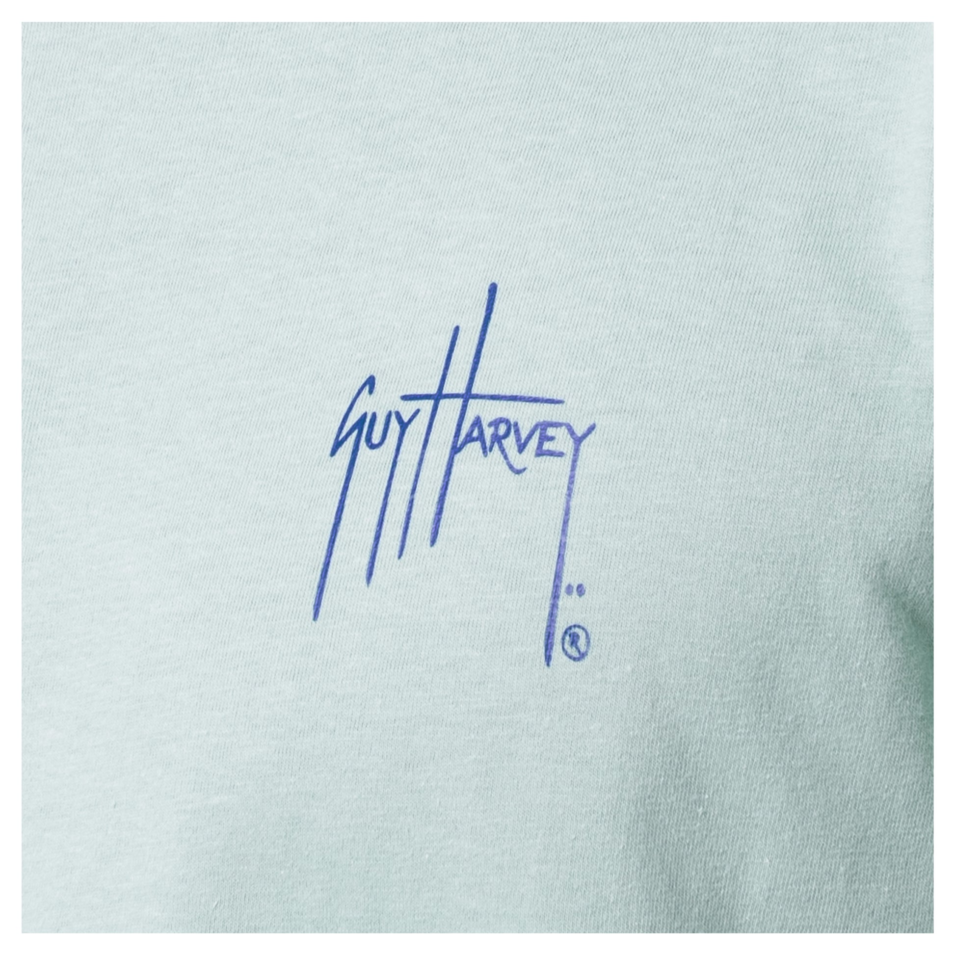 Guy Harvey logo on a light blue background