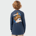 A child shown from the back wearing a navy blue long-sleeve shirt with a large graphic print on the back featuring a stingray with 'CATCH A WAVE' in white, orange, and blue.