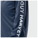 Close-up of a navy long sleeve featuring the brand name 'GUY HARVEY' printed vertically in white on the outer arm, set against a light gray background.