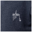 Close-up of a dark heather navy sweatshirt featuring a white embroidered 'GUY HARVEY' logo on the chest.