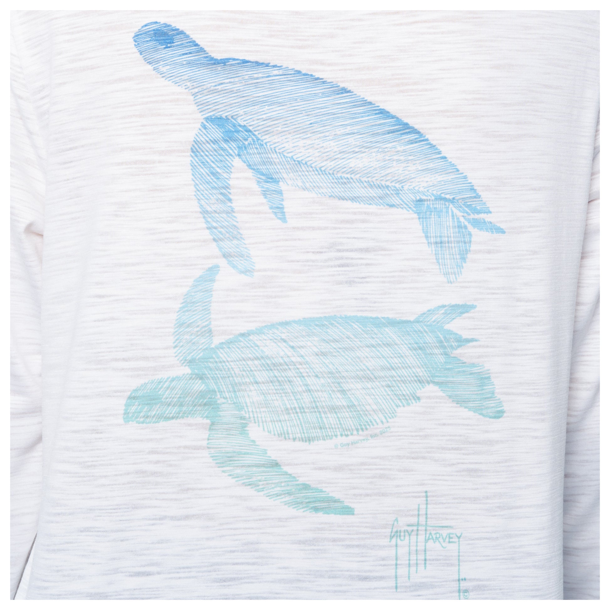 White shirt with blue turtle designs and 'Guy Harvey' branding.