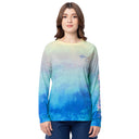 Woman wearing a long-sleeve shirt with a gradient design on a white background
