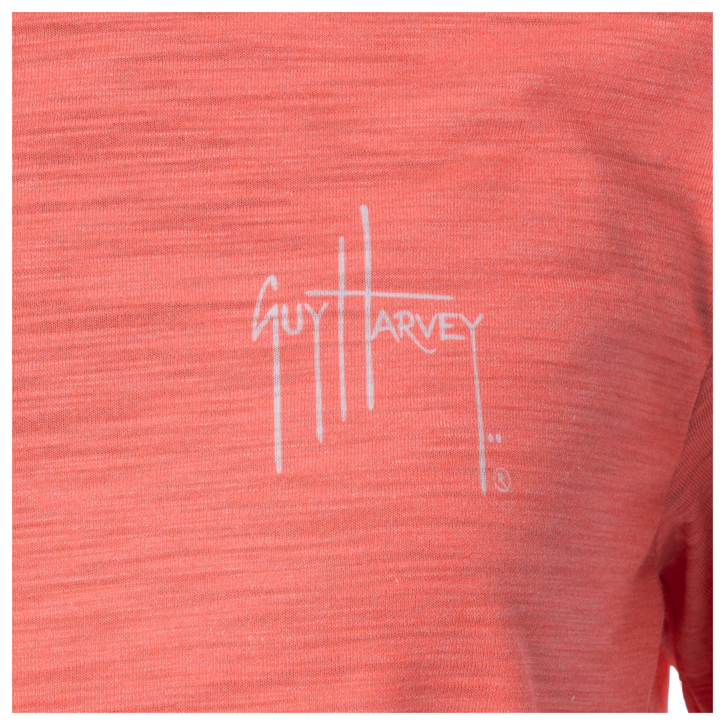 Coral shirt with Guy Harvey logo on a white background
