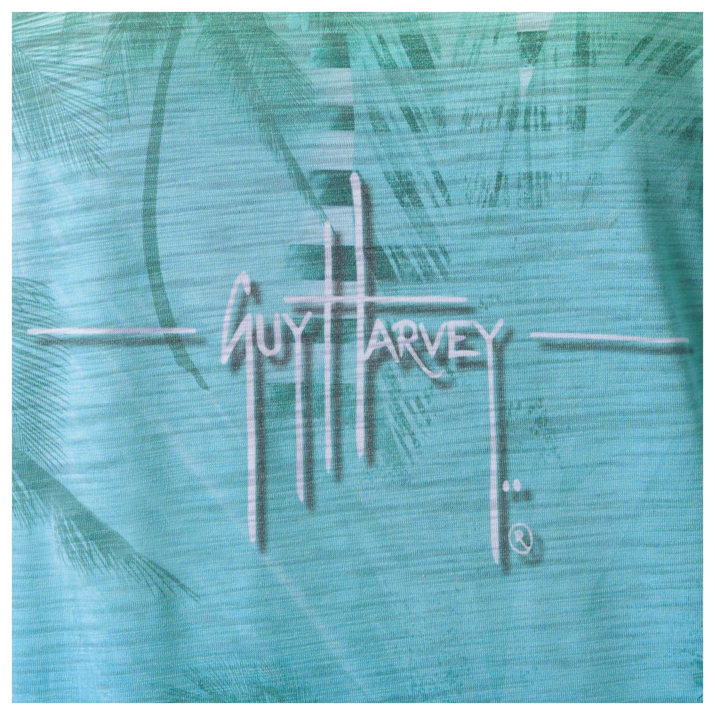 Guy Harvey logo on a textured teal background