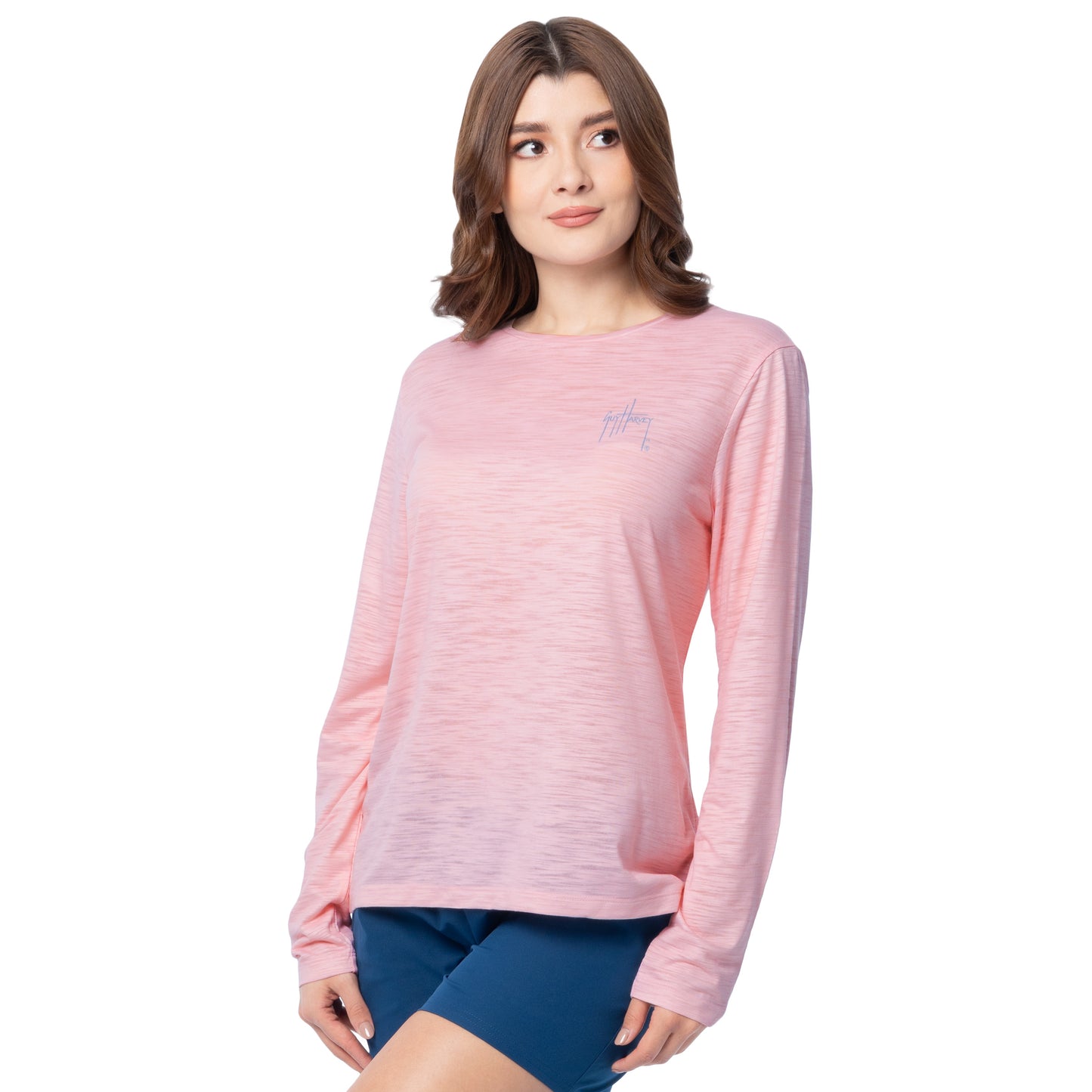 Woman wearing a pink long-sleeve shirt on a white background