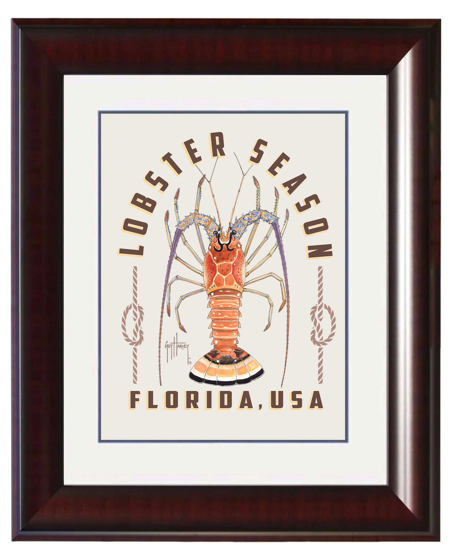 Framed artwork with a lobster illustration and 'Lobster Season Florida, USA' text.