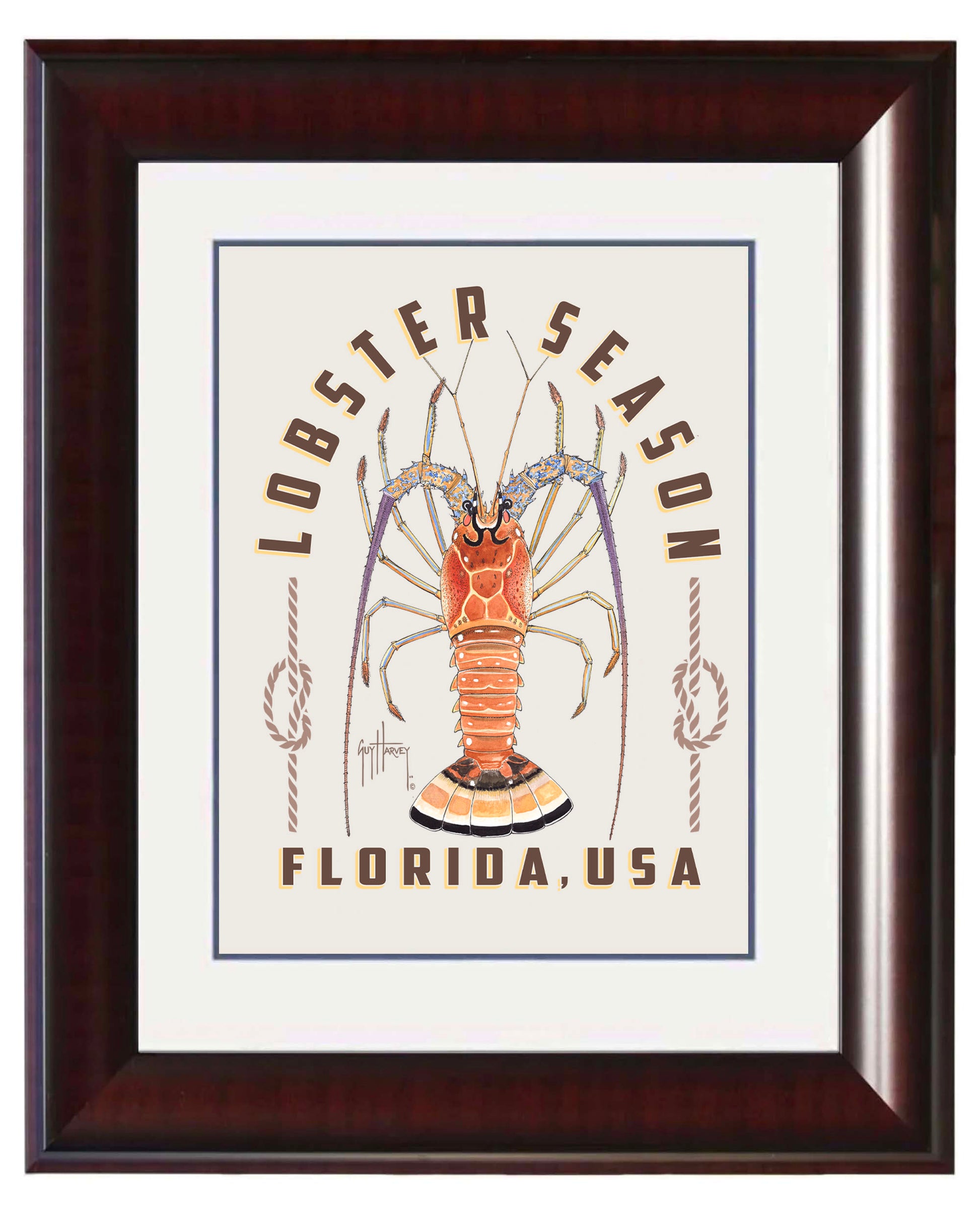 Framed artwork with a lobster illustration and 'Lobster Season Florida, USA' text.