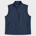 A navy blue sleeveless zip-up fishing vest with a stand collar, two zippered hand pockets, and a small GUY HARVEY logo on the left chest, shown against a light gray background.