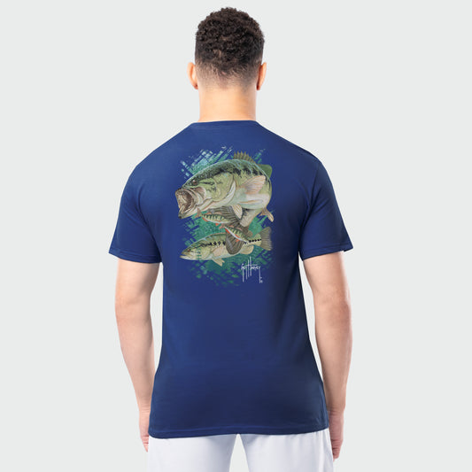 Person wearing a blue t-shirt with bass fish design on the back against a white background