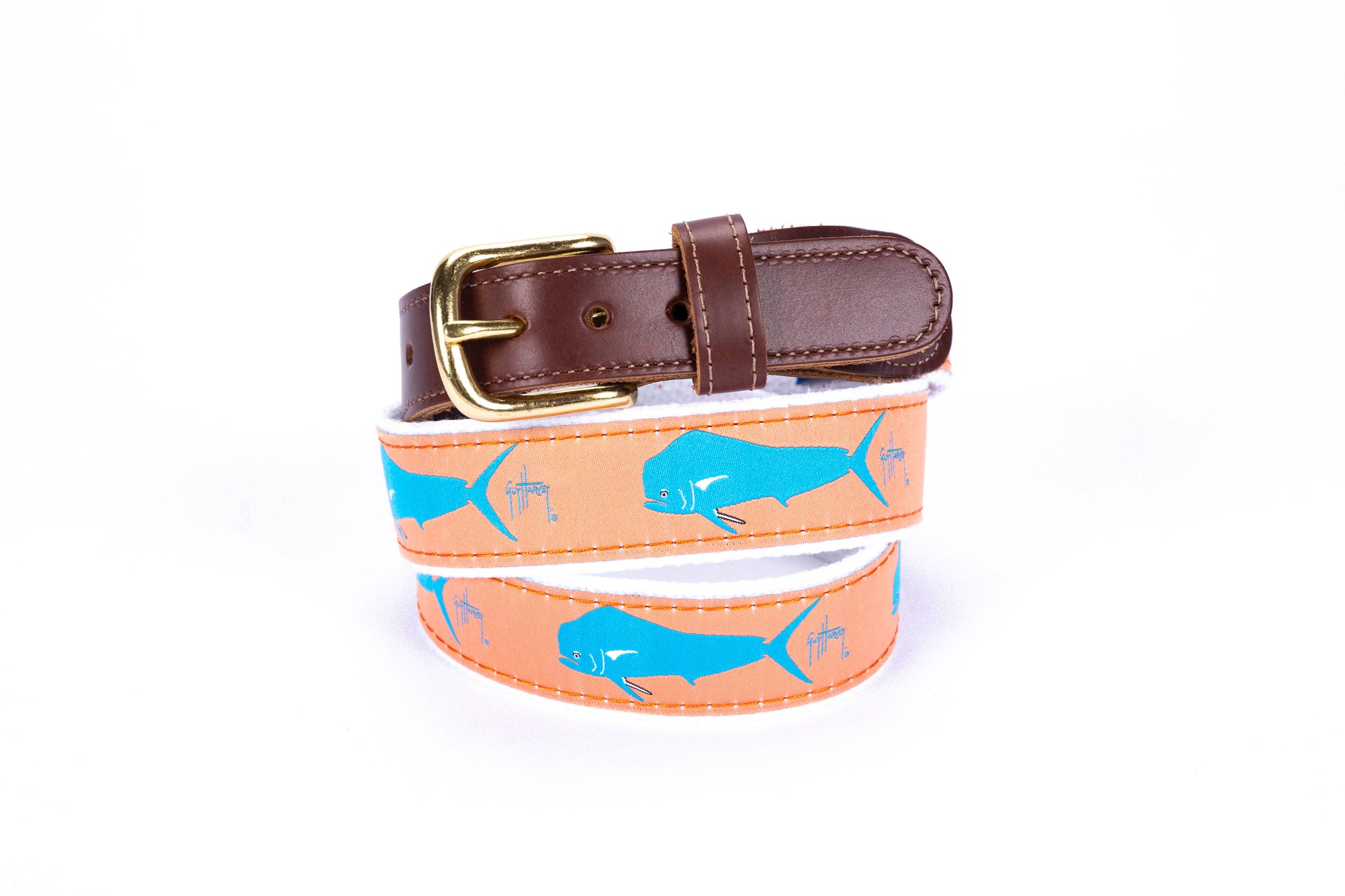 Guy Harvey Men’s Dorado Leather Tab Belt with orange cotton webbing, bright blue dorado fish art, brown leather tabs, and brass buckle.