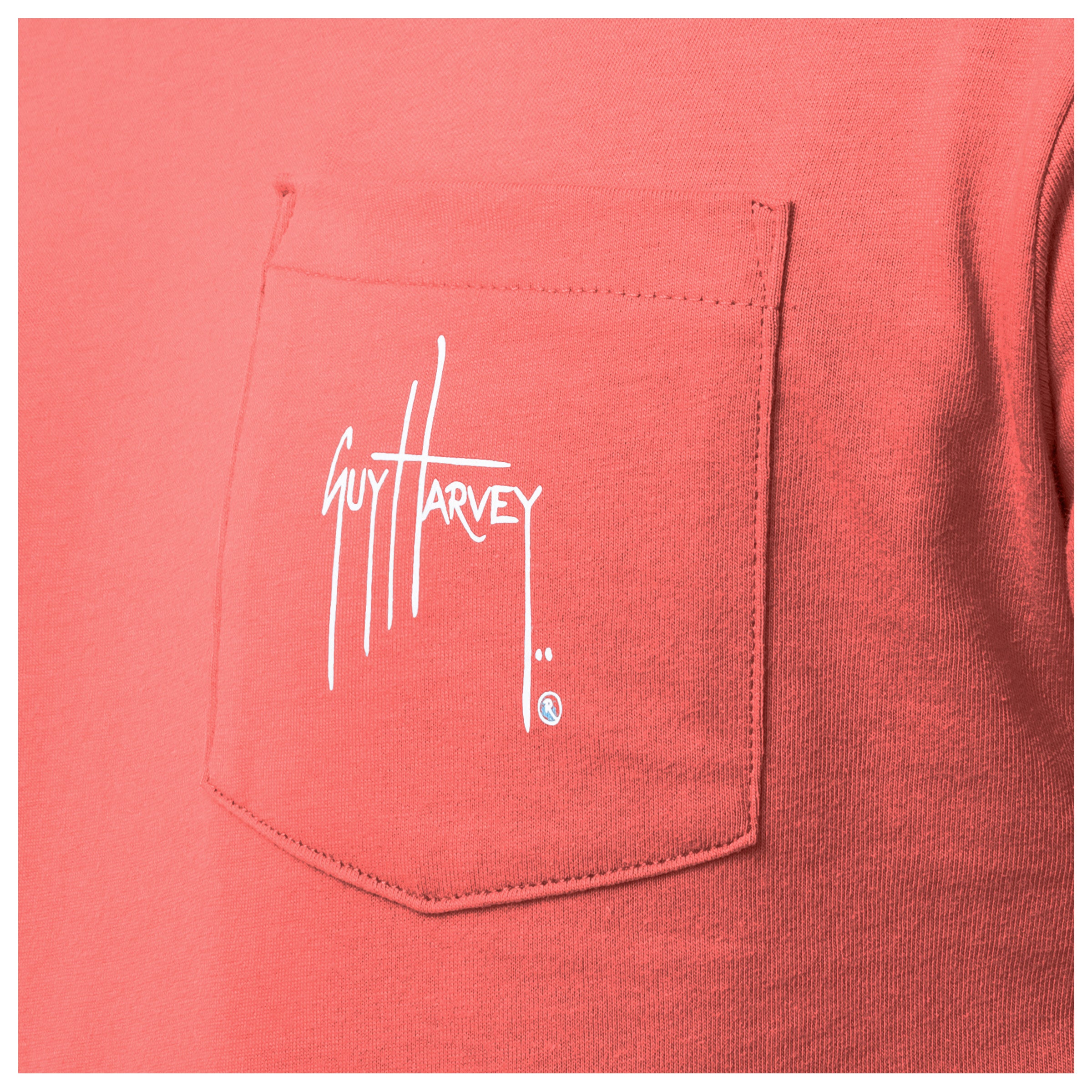 Coral shirt with Guy Harvey logo on a pocket