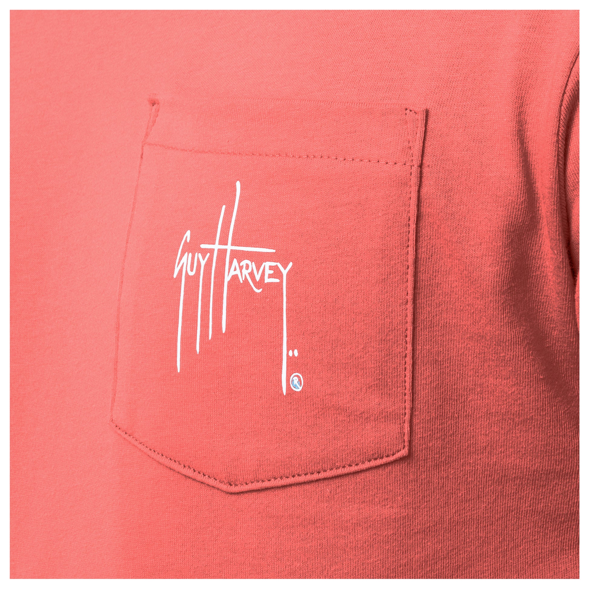 Coral shirt with Guy Harvey logo on a pocket