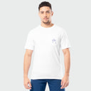 Man wearing a white t-shirt with a small Guy Harvey logo on a plain background