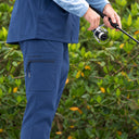 Close-up on the Angler Edge fishing pant, showcasing the technical pocket on the right leg. 