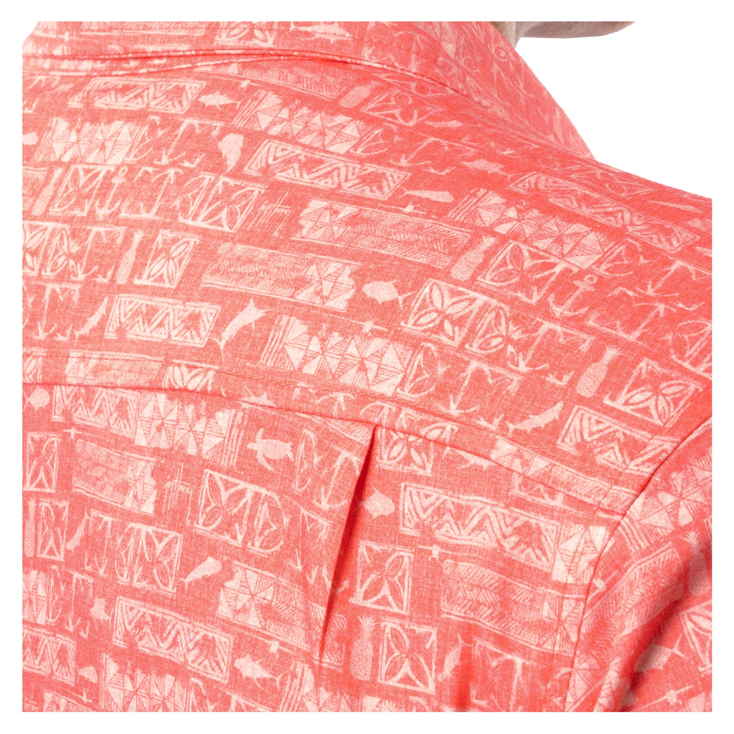 Detail of back pleat and texture on coral red Guy Harvey Men’s Aztec Printed Resort Shirt.