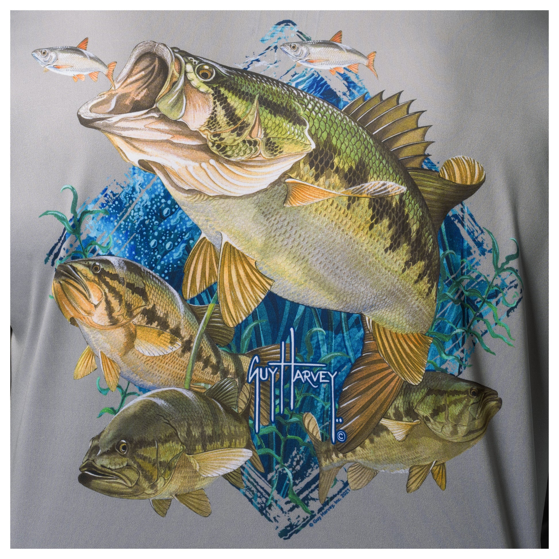 Close-up of Guy Harvey “Bass Diamond” artwork featuring freshwater bass illustration on light gray fabric.
