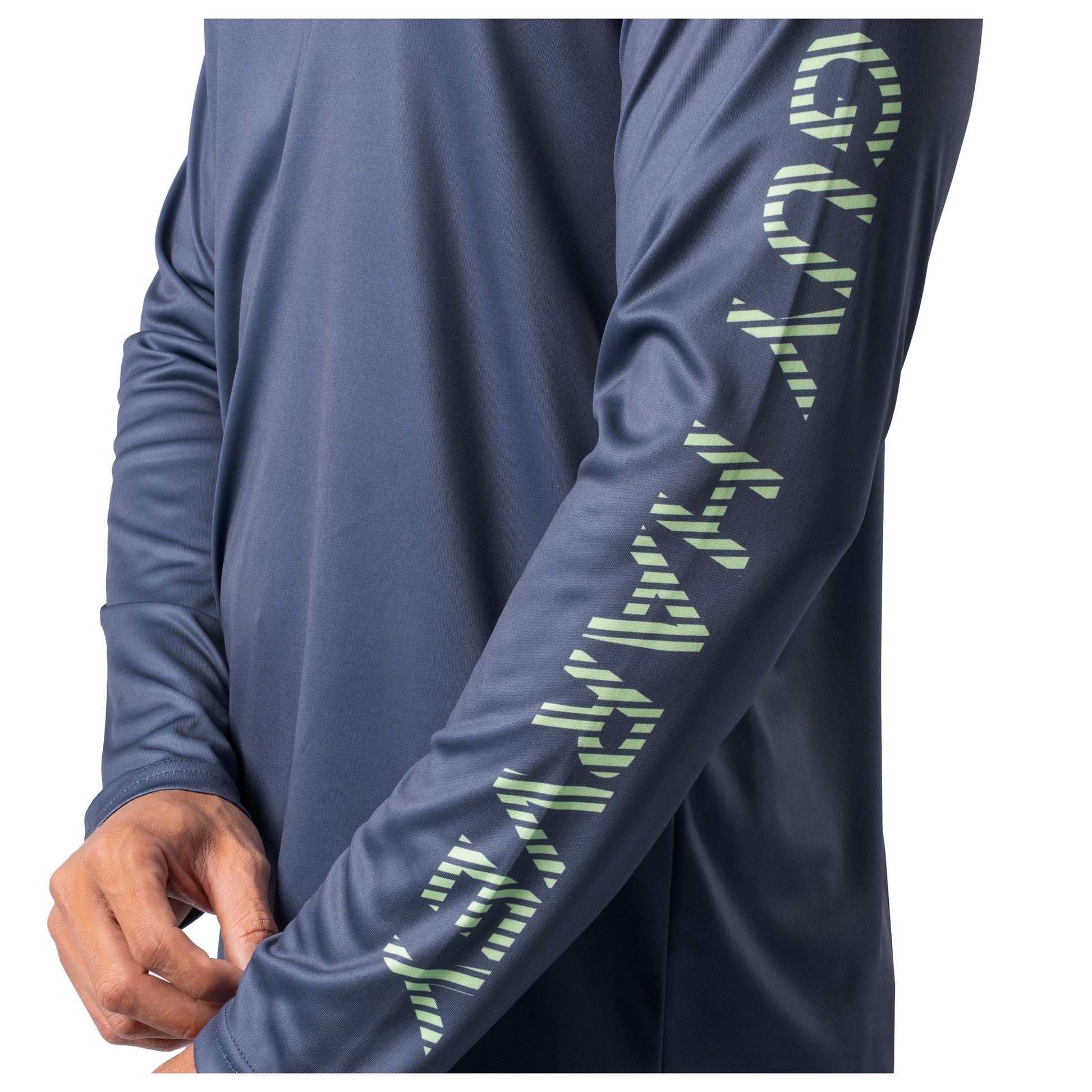 Detail of green Guy Harvey sleeve logo on navy blue Men’s Billfish Slam Sun Protection Hoodie.