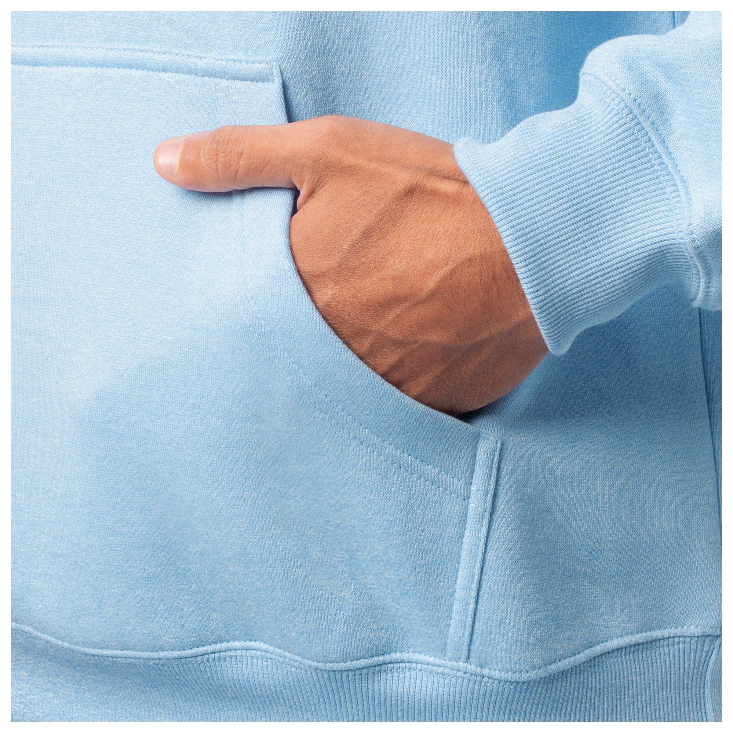 Close-up of a hand in the front pocket of a light blue Guy Harvey fishing fleece hoodie.