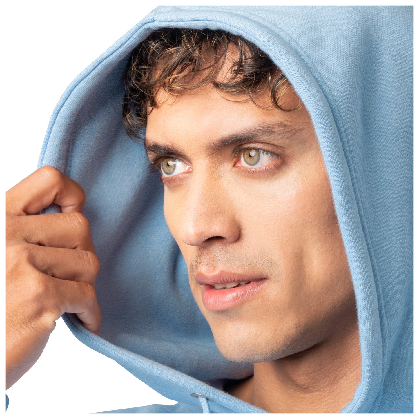 Close-up of a man wearing a light blue Guy Harvey fishing fleece hoodie with the hood up.