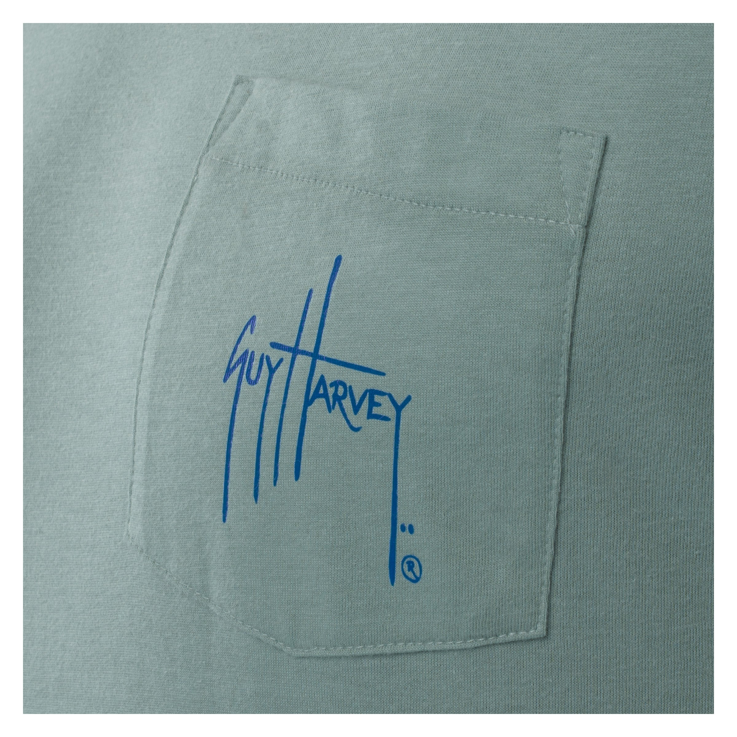 Green shirt with Guy Harvey logo on a white background