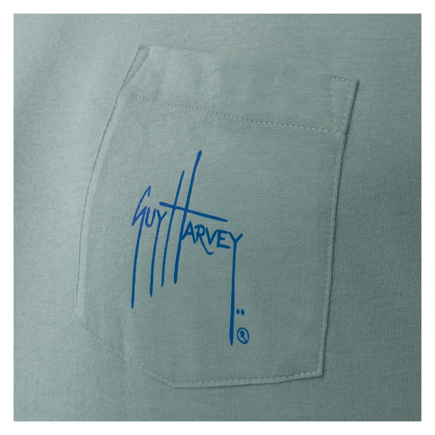 Green shirt with Guy Harvey logo on a white background