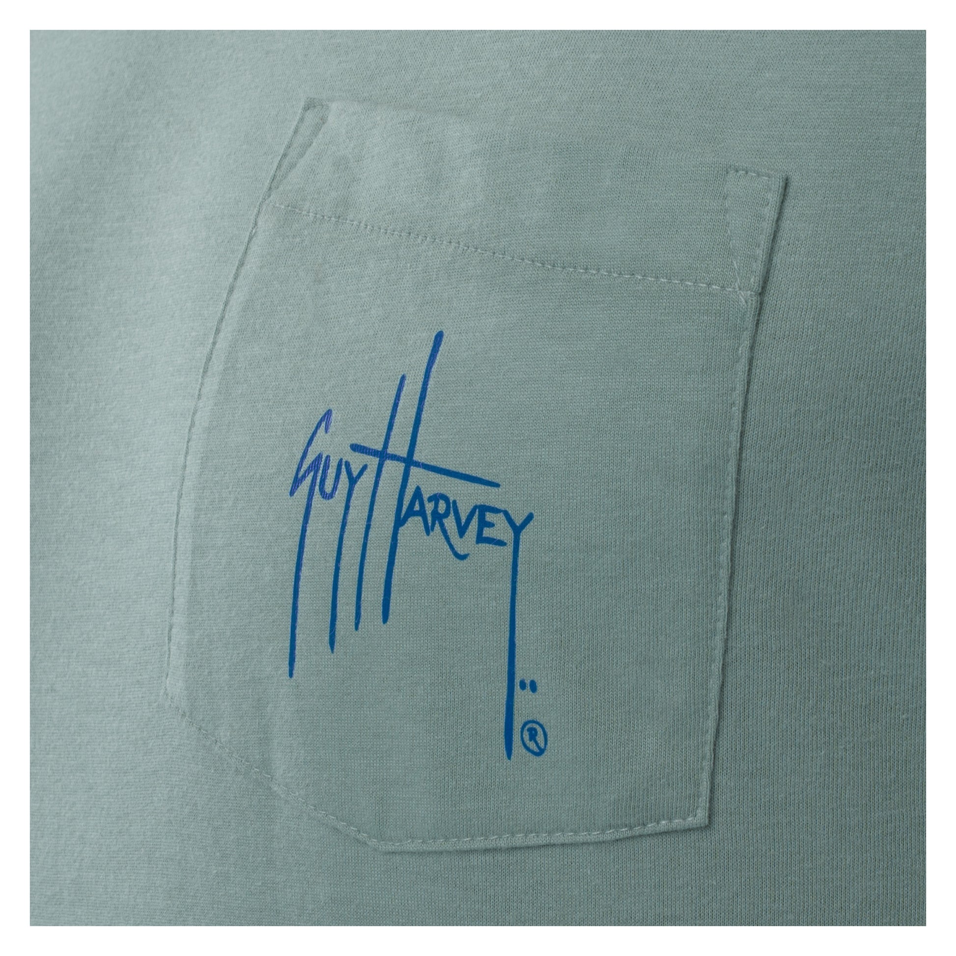 Green shirt with Guy Harvey logo on a white background