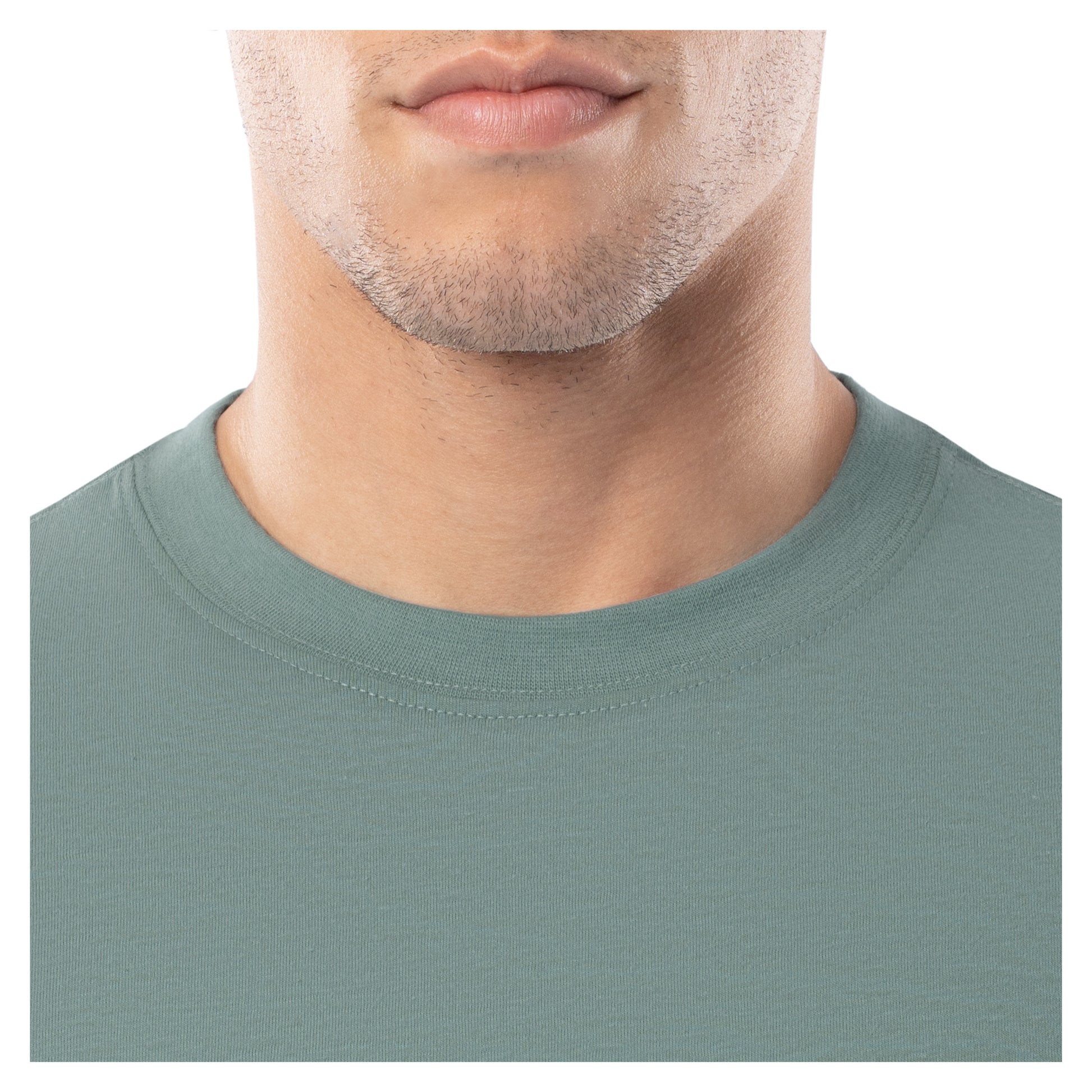Close-up of a person wearing a green t-shirt on a white background