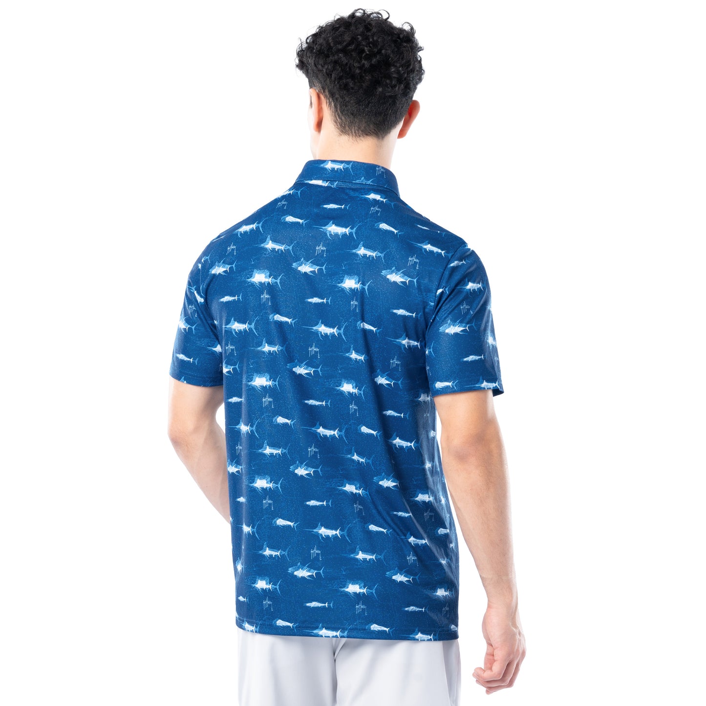 Back view of ocean blue Guy Harvey Men’s Double Vision Printed Performance Polo showing full fish pattern.